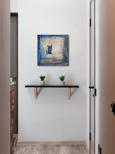 Load image into Gallery viewer, 12"x12"x1.5" blue painting on white wall above a shelf with 2 small plants