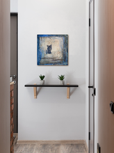 Load image into Gallery viewer, 12&quot;x12&quot;x1.5&quot; blue painting on white wall above a shelf with 2 small plants

